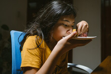 Pretty Teenage Girl Eating