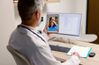 © Oleksii Syrotkin/Stocksy - Doctor video chat health communication technology