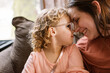 © Serena Burroughs/Stocksy - Smiling mother and daughter