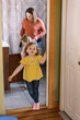 © Serena Burroughs/Stocksy - family in bathroom getting ready together