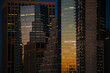 © Yakov Knyazev/Stocksy - Modern skyscrapers in downtown at twilight