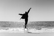 © Alba Vitta/Stocksy - aesthetic Man dancing at beach