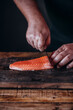 © Marta Mauri/Stocksy - Cutting Salmon Slices