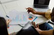 © Oleksii Syrotkin/Stocksy - Anonymous coworker data chart analysis project document