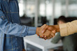 © Oleksii Syrotkin/Stocksy - Unrecognizable entrepreneur shaking hands make agreement