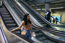 Woman Entering Subway Station