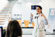 © VICTOR TORRES/Stocksy - Happy woman in medical uniform during work in clinic