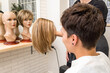 © Alvaro Lavin/Stocksy - woman choosing oncologic wig due to illness