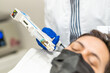 © Alvaro Lavin/Stocksy - doctor injecting blood plasma into the scalp