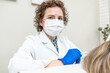 © Alvaro Lavin/Stocksy - doctor performing hair mesotherapy treatment on woman