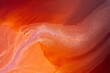 © Elena Saurius & Dani Rex/Stocksy - Abstract water on vibrant orange and red colors. Top view