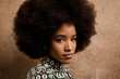 © VICTOR TORRES/Stocksy - Beautiful black woman with afro hair