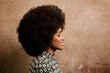 © VICTOR TORRES/Stocksy - Side view of beautiful black woman with afro hair
