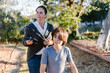 © ByLorena/Stocksy - Mother shaving her teenage son at garden