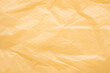 © Kwangmoozaa - Orange plastic bag texture background