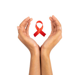 Wall Mural - Hands holding red ribbon isolated. HIV AIDS virus awareness