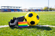 Rainbow colors of gay pride for fight for rights of LGBTQ people collective in soccer. Homosexuality and transsexuality in sport. Football equipment with captain's armband of the pride flag.