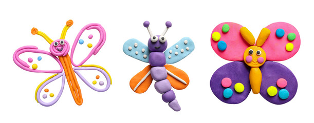 set with different colorful plasticine butterflies on white background, top view