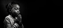Black And White Studio Portrait Of A Young Child Praying Banner On Black Background
