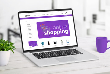 Wall Mural - online shop on laptop screen concept. modern ecommerce page with products and shopping cart