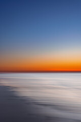 Wall Mural - Abstract view of the sunset at the beach on Juist, East Frisian Islands, Germany.