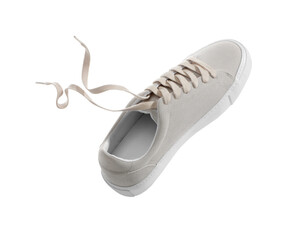 Sticker - One stylish beige sneaker isolated on white