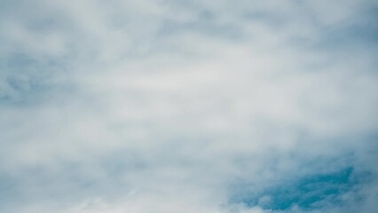 Wall Mural - White cloud blowing on blue sky in summer