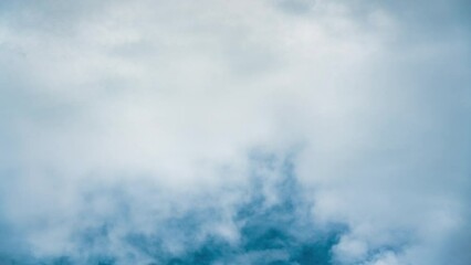 Wall Mural - White cloud blowing on blue sky in summer