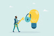 © STANISLAV - Unlock a new business idea, invent a new product or creativity concept, a guy holding a golden key is about to put the key into an idea light bulb. Vector flat style illustration.