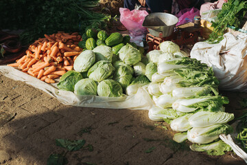 Cabbage, carrot, and other vegetables sold in traditional market after harvest