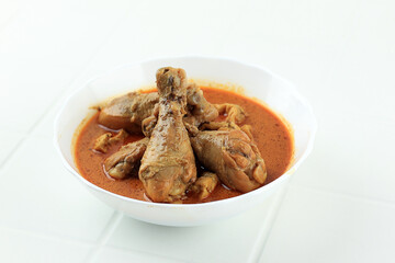 Wall Mural - Kare or Gulai Ayam , Spicy Chicken Curry Made from Chicken Thigh, Spices, and Coconut Milk.