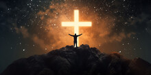 Christian Cross Symbol In The Night Sky With Silhouette Of Person With Their Arms Raised Worshipping God
