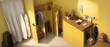 © Pixel Matrix - Overhead View of a Dressing room with yellow walls in Sunshine rays using Pencil sketch drawing style. Generative AI