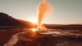 a geyser erupting water into the air at sunset, with hills in the background and a clear sky above The image is slightly blurred, giving it a dreamy, ethereal feel