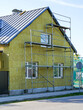 Thermal insulation of the facade of the residential house with thick rock mineral wool plates