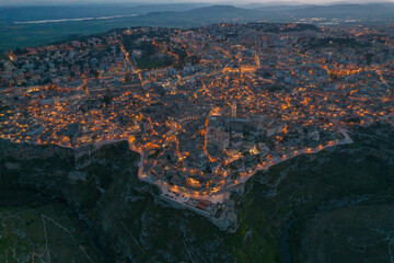 Wall Mural - Matera city skyline, the ancient town of Matera at sunrise or sunset, Matera, Italy