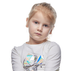 Wall Mural - portrait of a happy little girl on a uniform background in the studio.