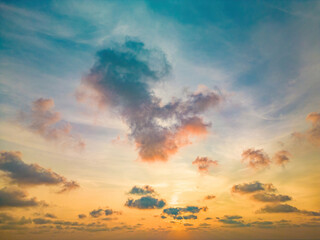 Wall Mural - Beautiful view of blue sky with clouds at sunrise. Partly cloudy.Background cloud summer. Cloud summer. Sky cloud clear with sunset. Natural sky cinematic beautiful yellow and white texture background