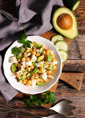 Wall Mural - chickpea salad with avocado and feta cheese