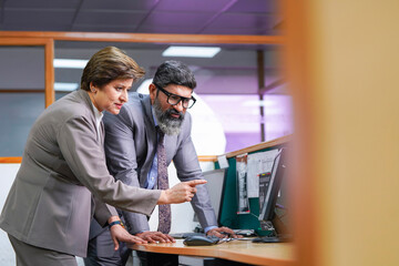 Wall Mural - Indian corporate man and woman working together