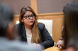 © Niks Ads - Indian corporate woman serious face expression while attending in meeting