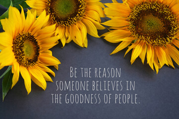 inspirational quote - be the reason someone believe in the goodness of people. with three sunflowers