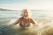 © Kalim - Illustration of mature senior woman in the sea