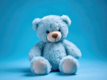Blue Teddy Bear On Blue Background With Copy Space For Your Text, Cuddly Stuffed Animal. Baby Shower For Newborn. Generative AI