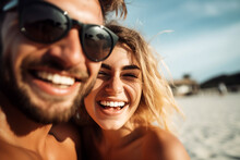 Young Couple With Sunglasses Has Fun Iat Beach During Hot Summer. Vacation And Holiday Picture For Wallpaper Or Background. 