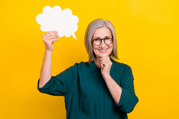 Sticker - Portrait of minded creative person hand touch chin hold empty space cloud card isolated on yellow color background