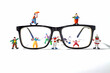 Concept miniature figure in the studio, clown club on the glasses