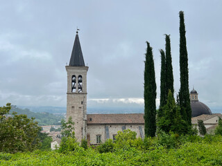 Wall Mural - View of Cathedral of Santa Maria Assunta with its tower from the hill in Spoleto, Italy