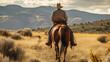 Cowboy mounted on horseback, viewed from behind, wearing a ha Generative AI