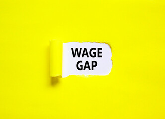 Wage gap symbol. Concept words Wage gap on beautiful white paper on a beautiful yellow background. Business, support and wage gap concept. Copy space.